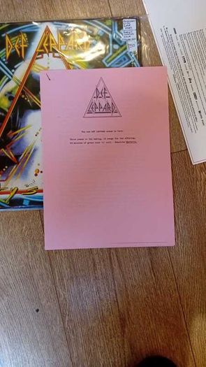 Def Leppard LP with original UK press release (1987)