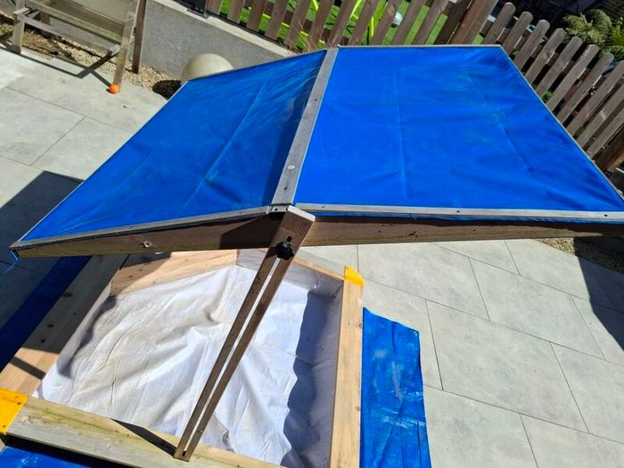 sand pit with canopy roof