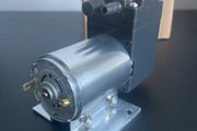 Pressure and vacuum pump