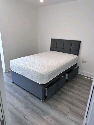 Gray Double bed and headboard