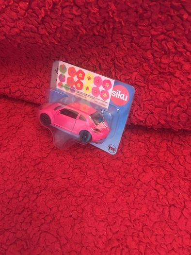 Toy car - brand new pink Volkswagen Beetle