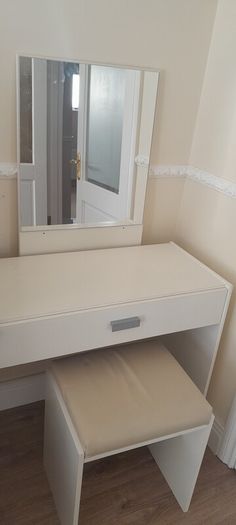 Dressing table with seat and mirror