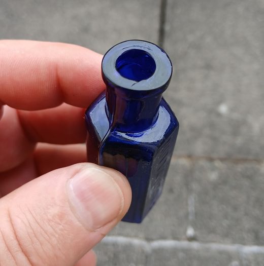 Rare Not To Be Taken 1/2oz blue glass bottle