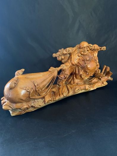 Vintage Maitreya Buddha figure carrying money bag