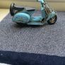 Vintage blue metal model of a Vespa Image 2