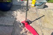 Young child's light up wheel scooter.