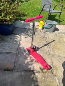 Young child's light up wheel scooter.