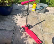 Young child's light up wheel scooter.
