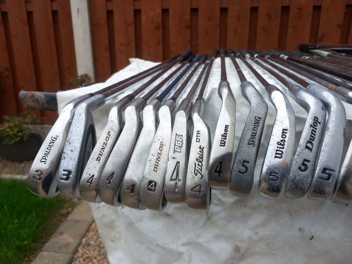 A selection of golf clubs and bags. NOT SELLING SEPARATE