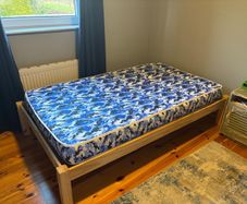 Single bed with safety rail