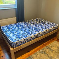 Single bed with safety rail