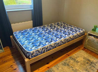 Single bed with safety rail