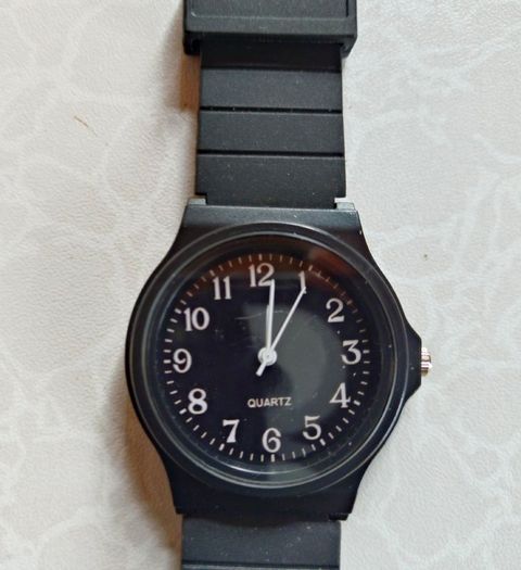 Black Face Plastic Watch (little Use).