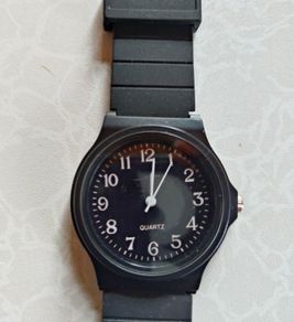 Black Face Plastic Watch (little Use).