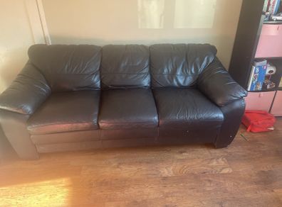 Free Black leather couch and foot rest