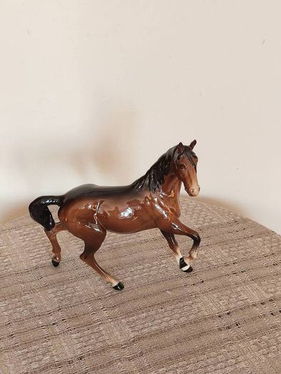 Vintage Royal Doultot porcelain horse. new in the box.