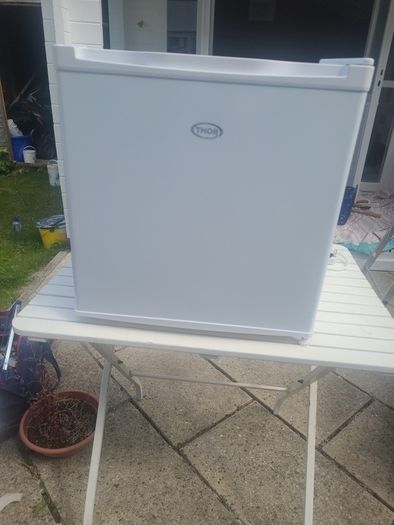 small fridge . with ice box