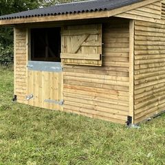 wooden horse stable