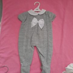 grey knitted baby onesey