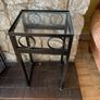Metal table with glass top, 6 chairs and side pieces Image 2
