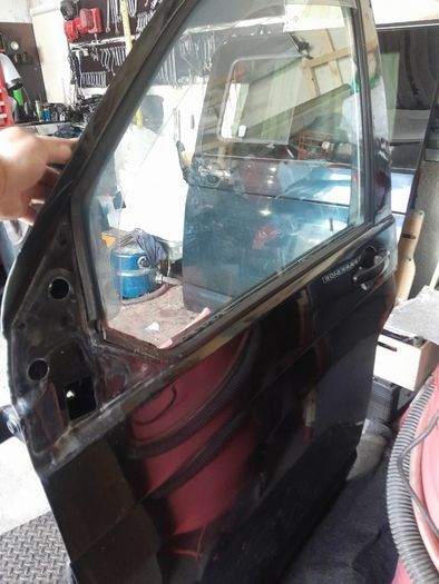 Wv T5 Sliding door  2007 with sliding window  black in coloure