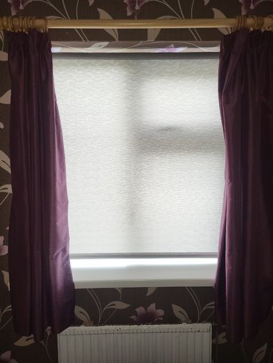 Plum coloured curtains