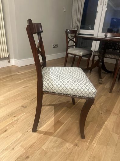 Extendable mahogany dining table and 8 Reprodux chairs