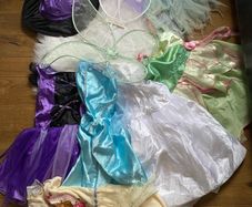Bundle of used fancy clothes, dresses, costumes , wings and accessories