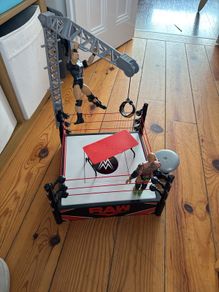 wwe smack down ring and two wrestlers
