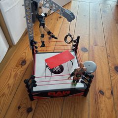 wwe smack down ring and two wrestlers