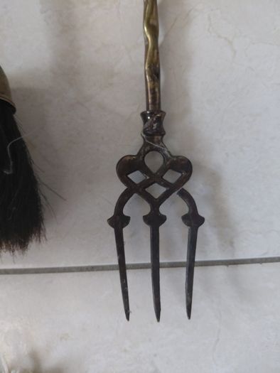 Antique French fireplace set 1950s features handles with various figures with animal finials
