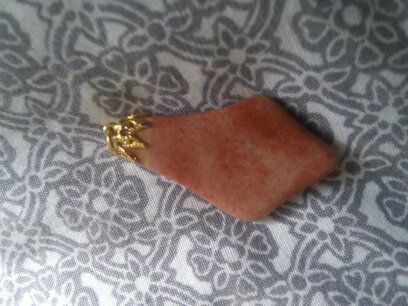 Necklace charm very nice and dressy .