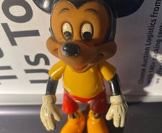 a vintage 1970s Walt Disney Productions hard plastic/vinyl jointed Mickey Mouse figure (made in Hong Kong)