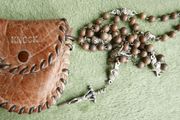 Vintage original Catholic rosary in its leather pouch