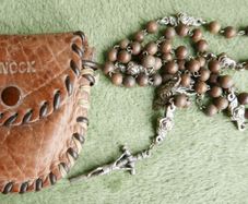 Vintage original Catholic rosary in its leather pouch