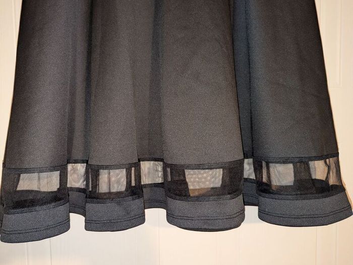 Gorgeous big pleat midi skirt with see through panel at bottom