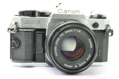 Canon AE-1 Program Silver/ Chrome 35mm SLR Film Camera with fast Canon FD 50mm f1. 8 FDn, Recently FULLY SERVICED and in Good Condition.