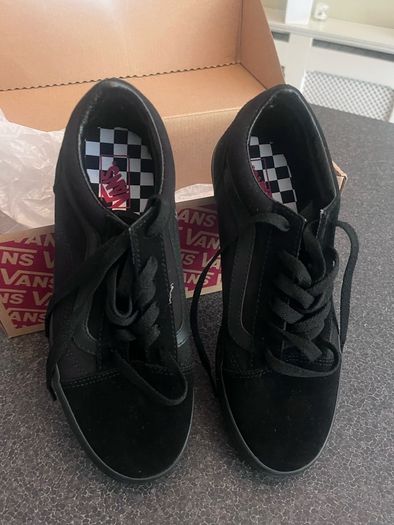 Brand new black Vans in the box
