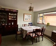 Hand carved Mahogany dinning table with 6 chairs