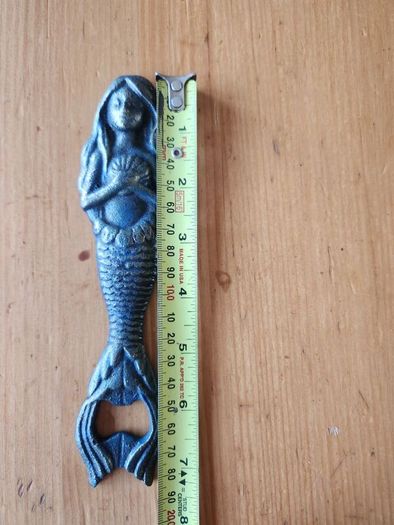 8 Items. 4 X Cast Metal Bottle Openers, A Cast Wallmounted Celtic Cross, 3 Harps For Decorative Purposes.