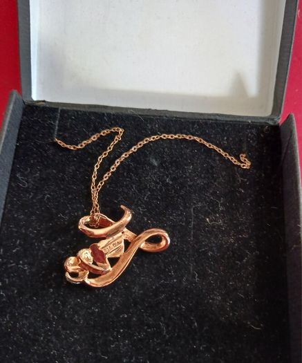 Sterling silver,gold plated with diamonds,pendant