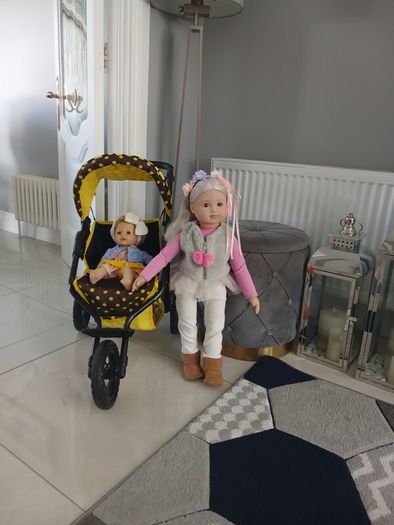 dolls and  buggy