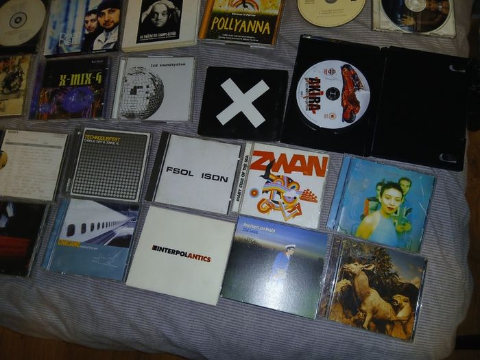 Collection of 58 assorted music CDs