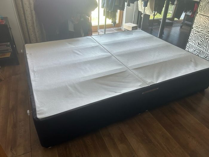 Free king size bed base with headboard for collection.