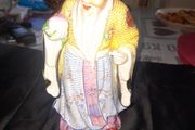 Beautiful Large Chinese Shou Xing porcelain figurine depicting the God of Longevity. It features an elderly man with a prominent bald head, holding a peach, which symbolizes long life, Postage Available, no chips or cracks