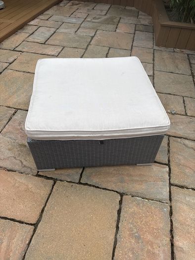Rattan garden table with cushion