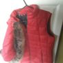 ladies red sleeveless Barbour jacket with detachable fur hood Image 4