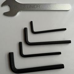 Bundle of hex keys and a wrench.