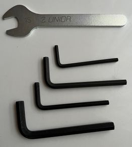 Bundle of hex keys and a wrench.