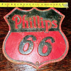 1960s cast metal wall sign advertising Phillip's 66 petroleum company
